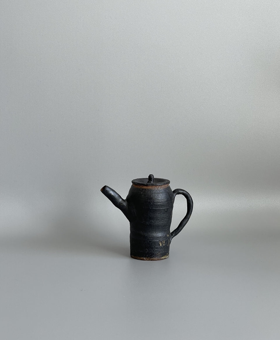 Humble Black Teapot