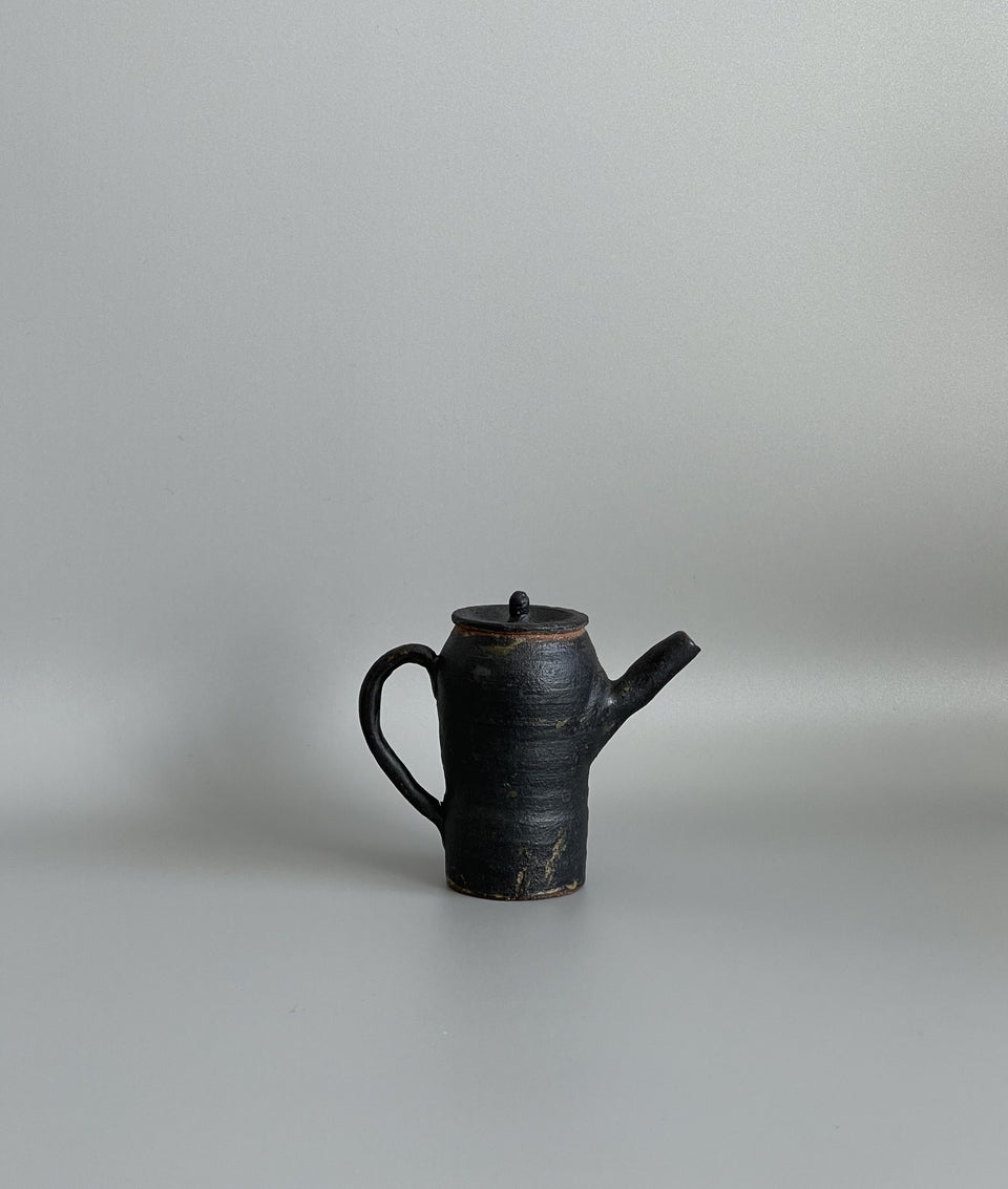 Humble Black Teapot